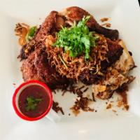28. Thai Southern Fried Chicken · Southern Thai fried chicken topped with fried garlic and crispy red onion.
