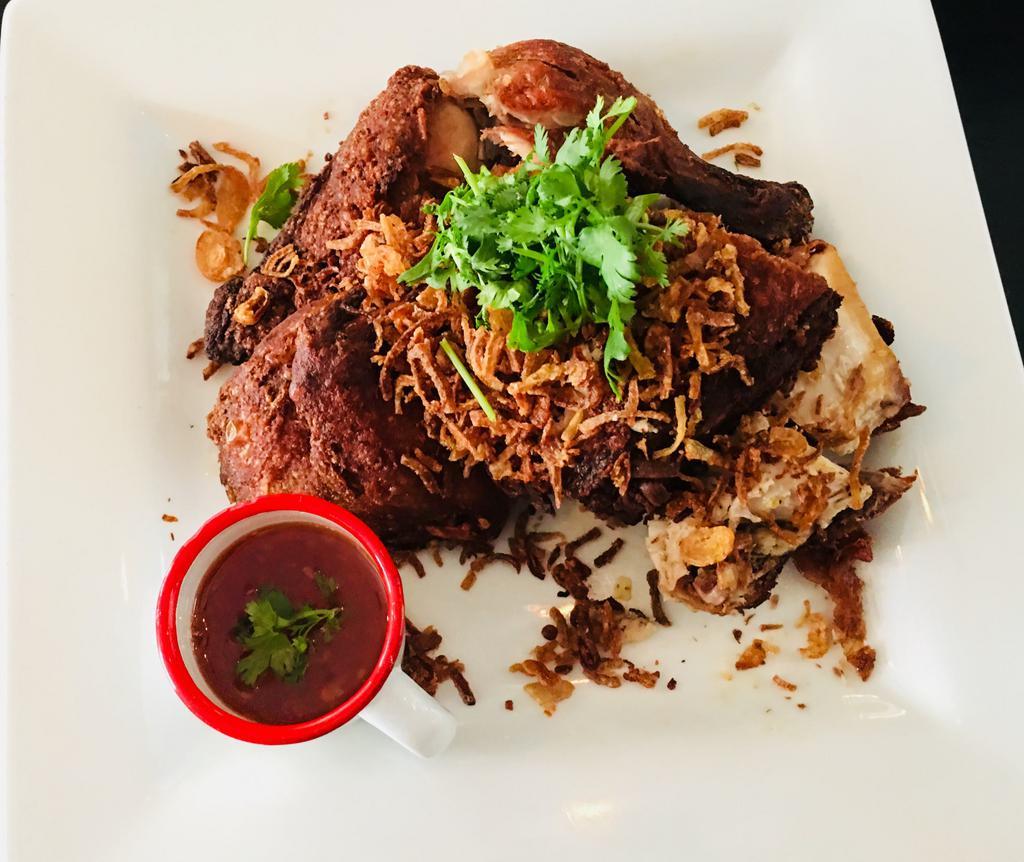 28. Thai Southern Fried Chicken · Southern Thai fried chicken topped with fried garlic and crispy red onion.