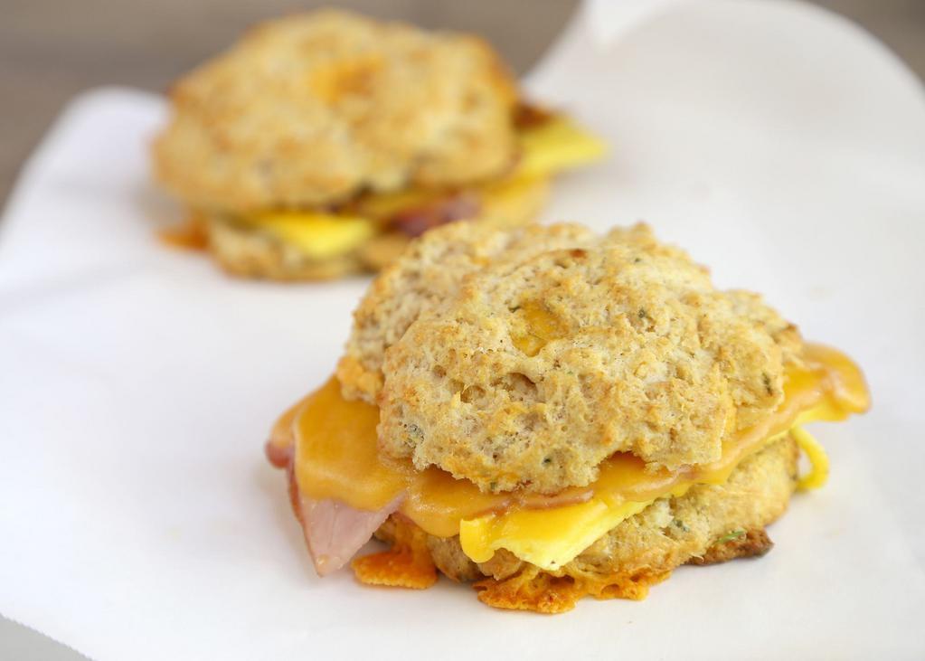 Classic Ham Egg & Cheese · Freshly made and served on your choice of Roll,  bread or tasty biscuit, ham, egg and cheddar cheese