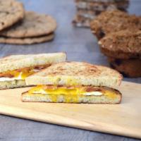 Classic Bacon Egg and Cheese · Bacon, cheddar cheese, egg and garlic herb spread on your choice of bread.  Bread Choices: r...