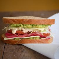 Veggie Baja Sandwich · Avocado, shaved cabbage, pickled red onions, tomato, pepper jack cheese, a chipotle honey li...