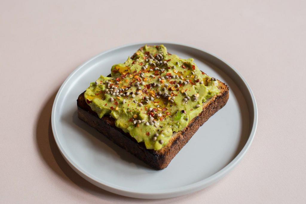 Chill Out · Balthazar seeded bread, avo mash, jalapeno citronette, chili mix powder, lime wedge, salt flakes, and black pepper.