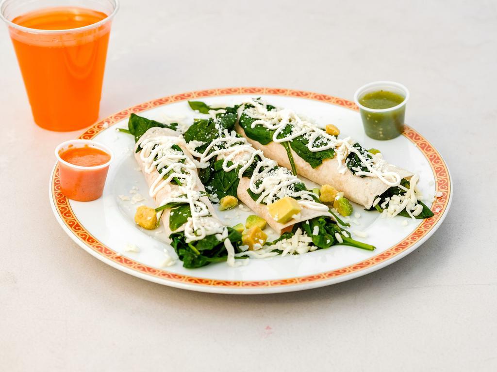 Corn/Spinach Crepes · 3 thin pancakes filled with corn and mozzarella cheese, peppers and salsa.