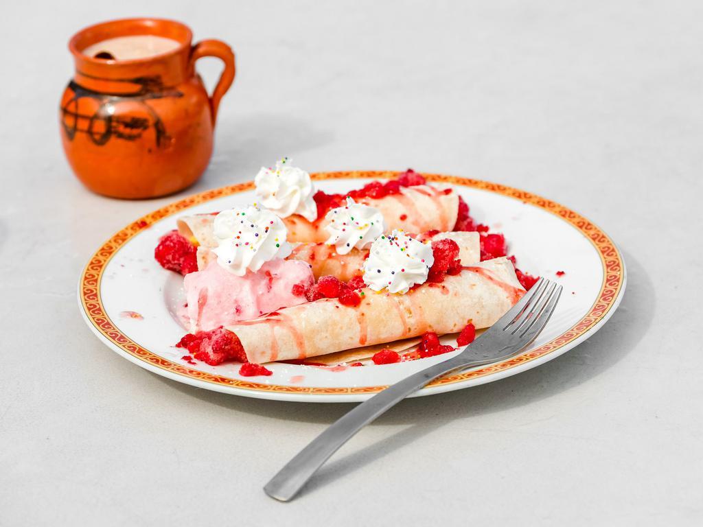 Crepes · 3 thin pancakes filled with cream cheese and strawberries or Nutella and banana. Topped with vanilla ice cream.