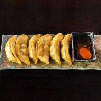 10. Pot Stickers · Deep-fried Chinese dumplings with a ground meat and vegetable fill-ing.