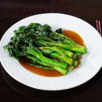 22. Chinese Broccoli with Ginger · Chinese broccoli, fresh ginger with a touch of wine. Vegetarian.