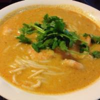 33. Laksa Noodle Soup · Prawn, chicken, bean sprout, rice noodle in spicy coconut soup. Very popular noodle dish. Sp...