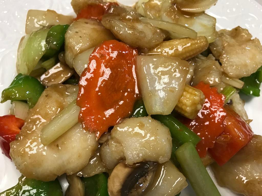 54. Ginger Fish · Boneless fish fillet stir-fried with ginger, onion, bell pepper mushroom, celery and wine. Rice not included.