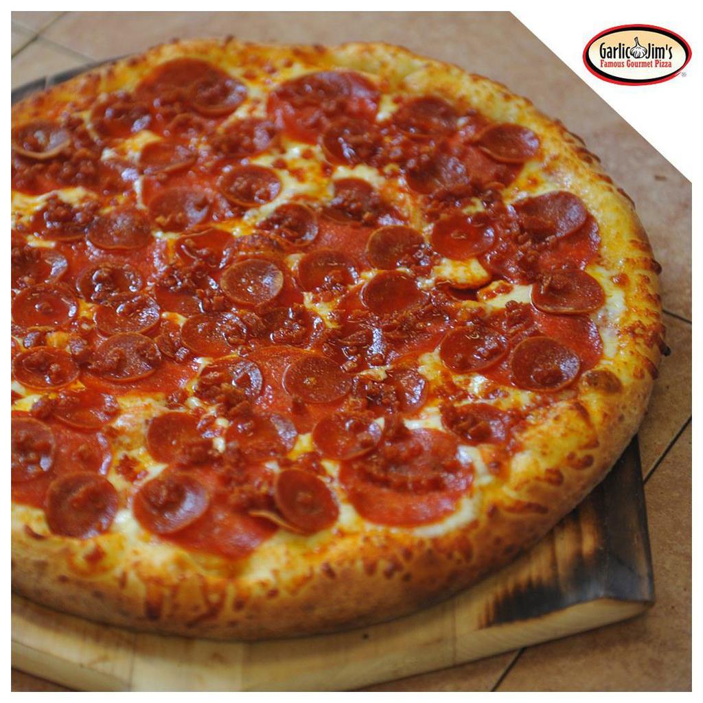 Triple Pepperoni Smackdown Large Pizza · 3 unique styles of pepperoni...layered between melted mozzarella cheese, topped with Parmesan cheese and blended together for the ultimate pepperoni lover's smackdown!