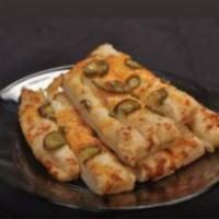 Cheesy Jalapeno Breadsticks · Served with jalapeno and a mixture of cheddar and mozzarella cheese. You'll love this twist ...