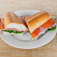 Italian Hero · Boar's Head ham, Genoa salami, pepperoni and provolone with the works! (lettuce, tomato, oni...