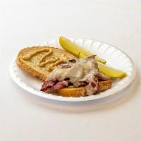 Prime Hot Pastrami Sandwich · Boar's Head pastrami and melted Swiss cheese served on toasted rye bread with mustard.