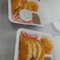 Queso Taco Platter · 4 queso tacos with your choice of meat and a side of rice and beans.