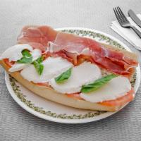 Caprese Sandwich · Fresh mozzarella, tomato, basil, and pesto sauce.