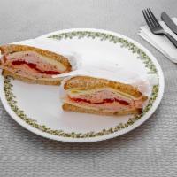 Honey Turkey Sandwich · Roasted red pepper, mozzarella cheese, and honey mustard on whole-wheat bread.