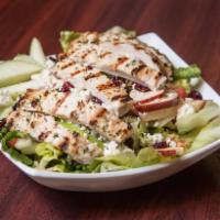 Chopped Salad · Grilled chicken, apples, walnuts, dried cranberries, tomatoes, cucumbers and crumbled Bleu c...