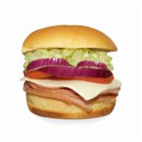 Ham and Cheese Sandwich · Stacked smoked ham with cheese, lettuce, tomato, onion, and mayonnaise.