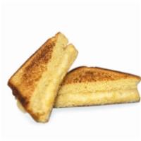 Grilled Cheese Sandwich · Texas toast buttered than grilled with 2 pieces of cheese.