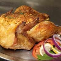 Whole Rotisserie Chicken · Tender, juicy, slow-roasted whole rotisserie chicken with our special blend of herbs and spi...
