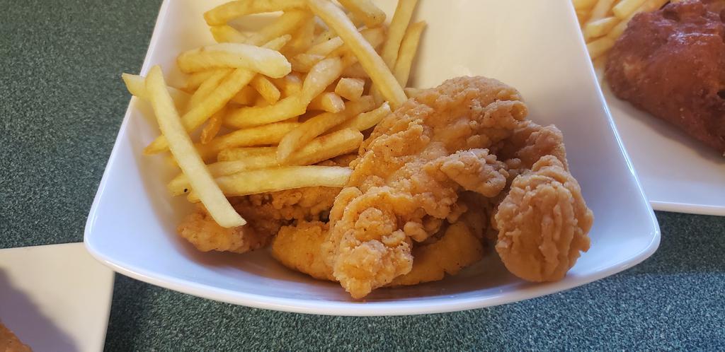 Chicken Tenders · chicken tenders when fried fresh can be juicy and a great option along with fries and ranch