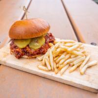 Pulled Pork Sandwich · BBQ pulled pork, sweet and spicy pickles served with fries.