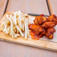 Buffalo Chicken Wings · 6 pieces Buffalo chicken wings basket served with fries.
