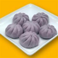 Steamed Taro Bao · 6 buns. Consists of a light sweet paste in the center of the bao.
