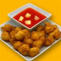 Chicken Nuggets · 20 pieces. Breaded or battered crispy chicken. Add sweet and sour sauce for an additional ch...