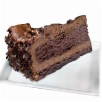 Chocolate Mousse Cake · Rich chocolate mousse served over a decadent chocolate cake layer and topped with creamy cho...
