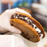 Ice Cream Cookie Sandwich · A Scoop of Vanilla Ice Cream in-between 2 Home-Made Cookies