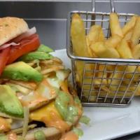 Special Burger · Beef or chicken, cheese, egg, sticks potatoes, avocado, onions, tomatoes and sauces. 