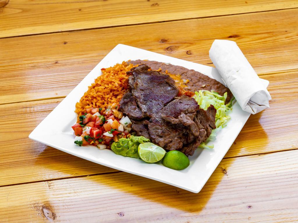 4. Carne Asada Plate · 2 thin carne asada steak with guacamole, pico de gallo, lettuce and corn or flour tortilla on the side.