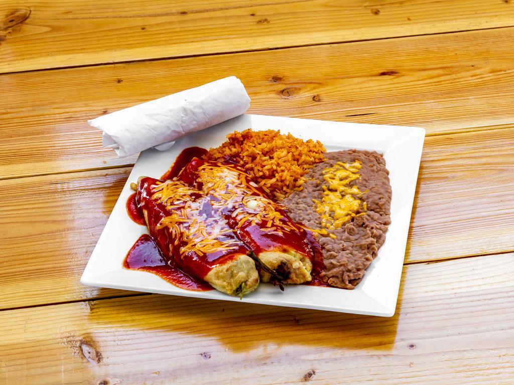 7. Chiles Rellenos Combo · 2 chiles rellenos smothered with enchilada sauce, lettuce, cheese and corn or flour tortillas on the side.
