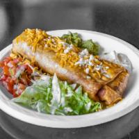 8. Chimichanga Plate · Deep fried burrito, guacamole, sour cream, lettuce, pico de gallo and cheese. Carne asada or...