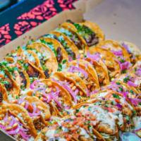 Party Tacos Platter · Comes with a total of 30 tacos with chips. 
