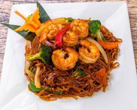 Lava Noodles · Sautéed rice noodles, mixed veggies in a roasted chili paste. Choose your spice level: medium, hot, Thai hot or inferno.