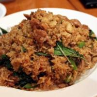 Spicy Basil Fried Rice · Stir fried rice, broccoli, carrots, basil leaves, bell peppers, onions in spicy Thai chili s...