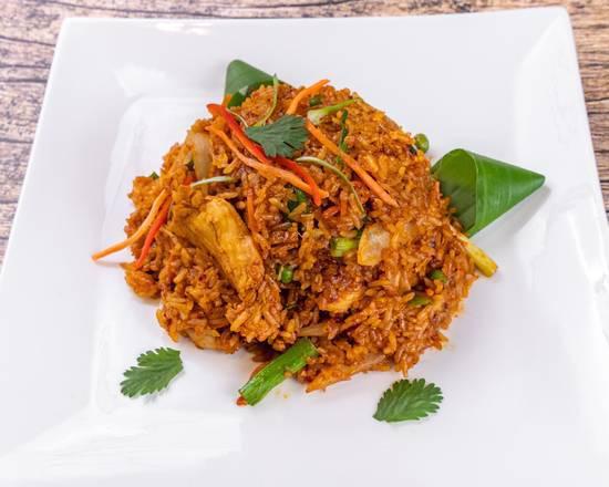 Inferno Fried Rice · Inferno fried rice with onions, carrots, and green onions in a roasted chili paste.