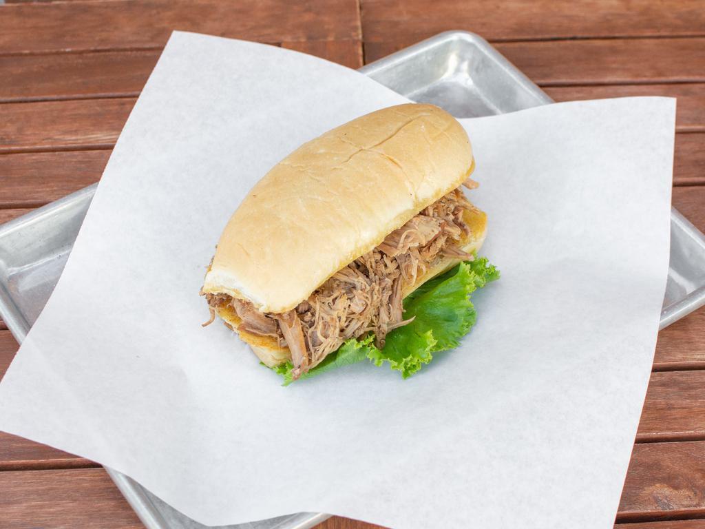 Pulled Pork Sandwich · Smoked pulled pork on a toasted hoagie roll.