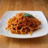 Spaghetti Amatricana · Spaghetti with pancetta (bacon), onions, and tomato sauce.
