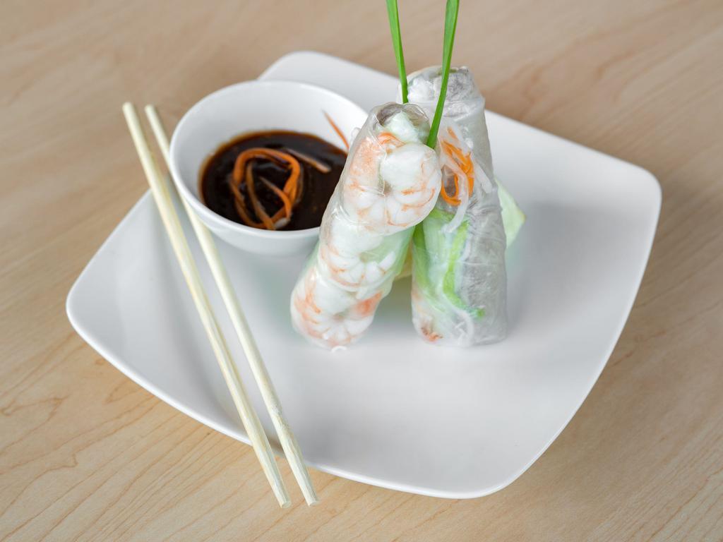 1. Goi Cuon · Fresh garden spring rolls. Shrimp, pork, lettuce, vermicelli noodles, and mint wrap in rice paper served with house special hoisin-peanut sauce.