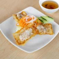 2. Cha Gio · Crispy seafood egg rolls. Crispy egg rolls with pork meat, shrimp, carrots, and taro served ...