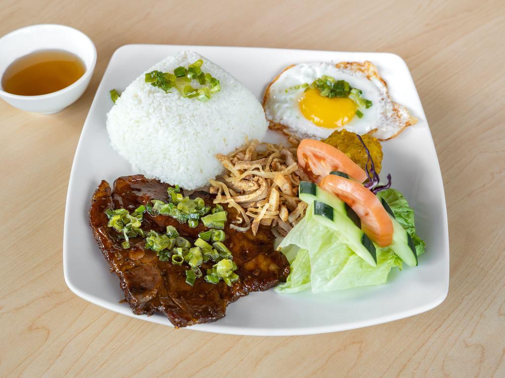 18. Com Suon Nuong · Grilled pork chop.