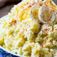 POTATO SALAD · Southern-style potato salad with eggs, pickles (sweet and dill), mustard and mayo, and speci...