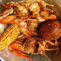 M5.blue crab(1lb) · Fresh Blue Crab with corn and potato, choose one our signature sauces and enjoy.
