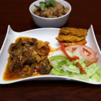 Oxtail · Served with rice and beans, fried plantain and salad.