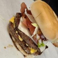 #6. 1/2 Bacon Cheese · 1/2 lb. beef pattie, lettuce, tomato, onion, ketchup, mustard, pickle, cheese, bacon. Make i...