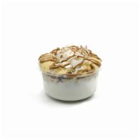 Coco Power Coconut Bowl · Coconut blend with vanilla protein topped with granola, banana, coconut flakes, and almond b...