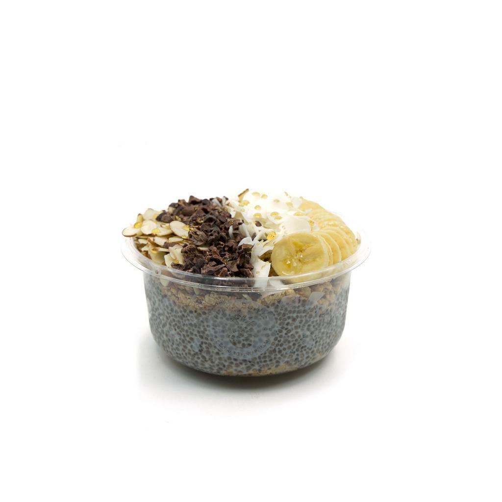 Almond Joy Bowl · Chia seeds, coconut milk, agave, vanilla, granola, almonds, banana, raw cacao and honey.