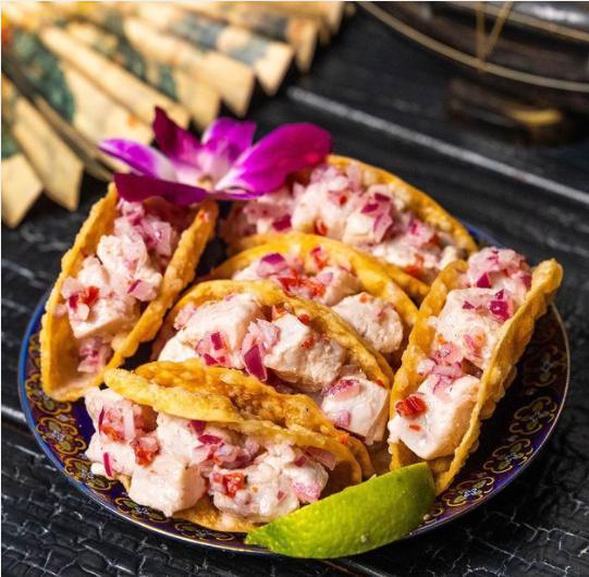 Ceviche Traditional Style Tacos · Peruvian style ceviche topped with diced purple onion.